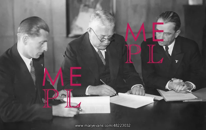 : Hadamovsky, Chamiec and Boeckmann signing the German-Pol : Hadamovsky, Chamiec and Boeckmann signing the German-Pol