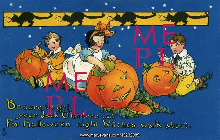  : Halloween. Children making Jack o Lanterns out of pumpkins