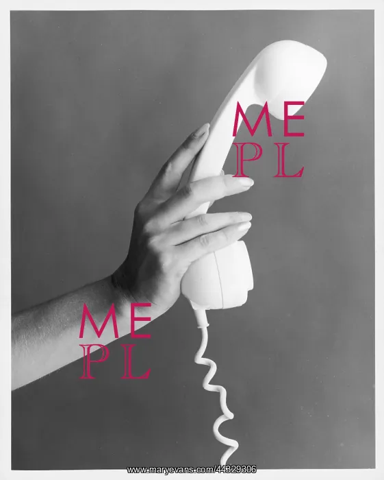 : HAND HOLDS A TELEPHONE : HAND HOLDS A TELEPHONE