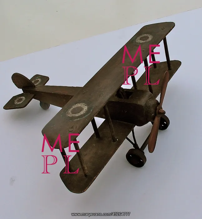 : A hand-made wooden model of a WWI biplane : A hand-made wooden model of a WWI biplane