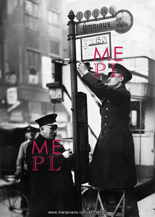 : Hanging a sign with fares, 1934 : Hanging a sign with fares, 1934