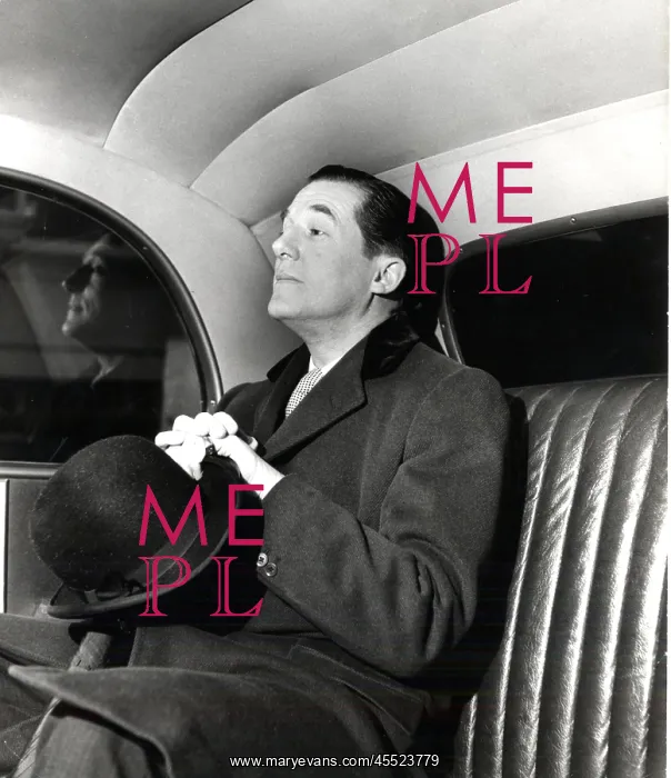 : Hardy Amies in the back of a car : Hardy Amies in the back of a car
