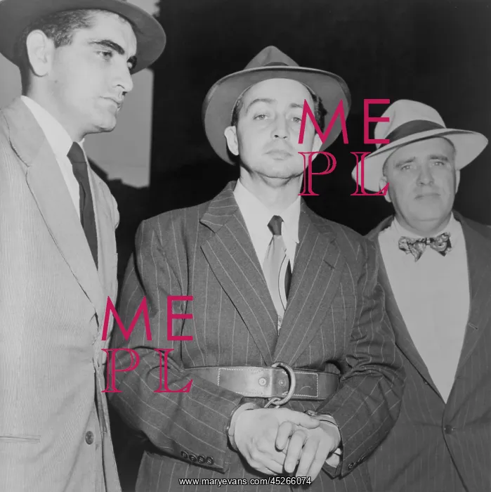 : Harry Gold under arrest for spying in 1950. He : Harry Gold under arrest for spying in 1950. He