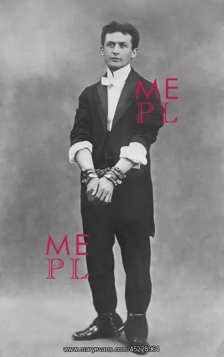 : Harry Houdini, escapologist, in chains : Harry Houdini, escapologist, in chains
