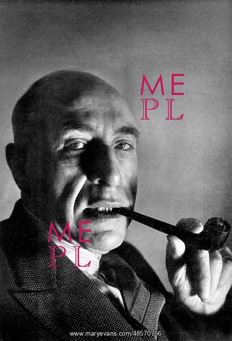 : Harry Price smoking a pipe : Harry Price smoking a pipe