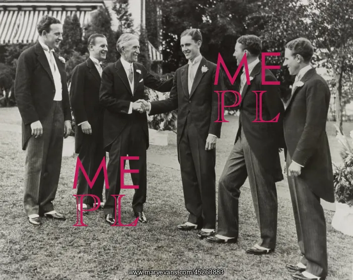  : Harvey Firestone congratulating his youngest son