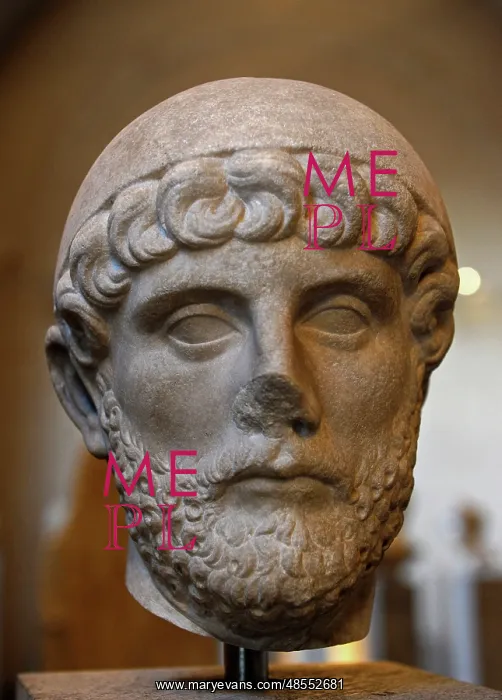  : Head of a man with a Priest's cap. About 120 AD