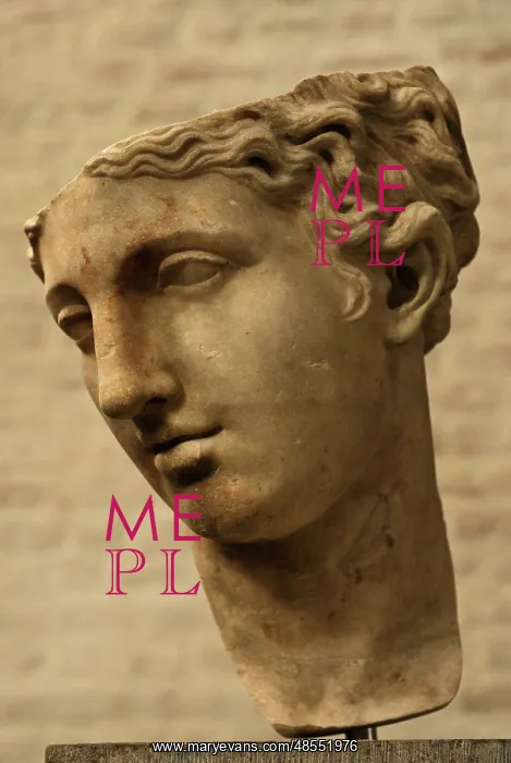 : Detail of a head of the statue of a goddess. Roman copy : Detail of a head of the statue of a goddess. Roman copy