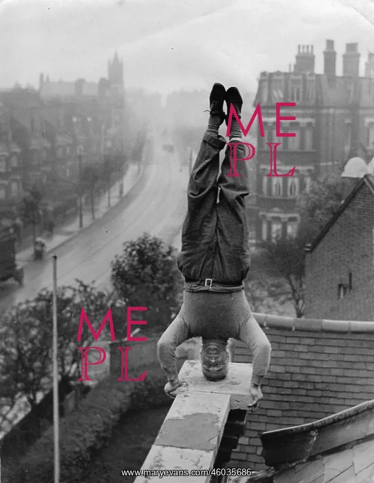 : Headstand on a roof : Headstand on a roof