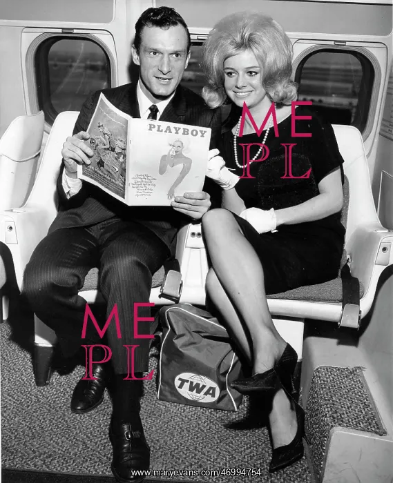 : Hefner Poses with Covergirl : Hefner Poses with Covergirl