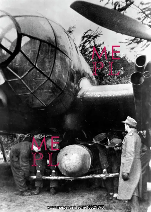 : Heinkel He 111 with supply bombs, 1945 : Heinkel He 111 with supply bombs, 1945