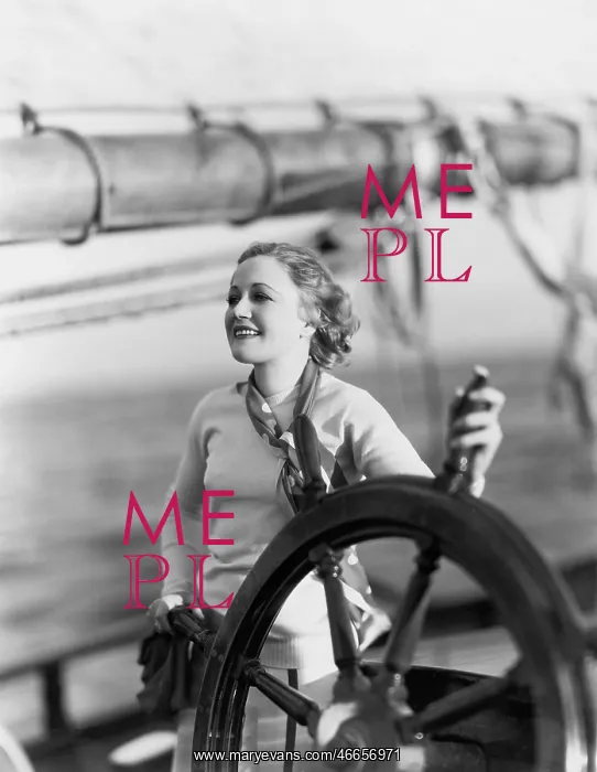 : AT THE HELM : AT THE HELM