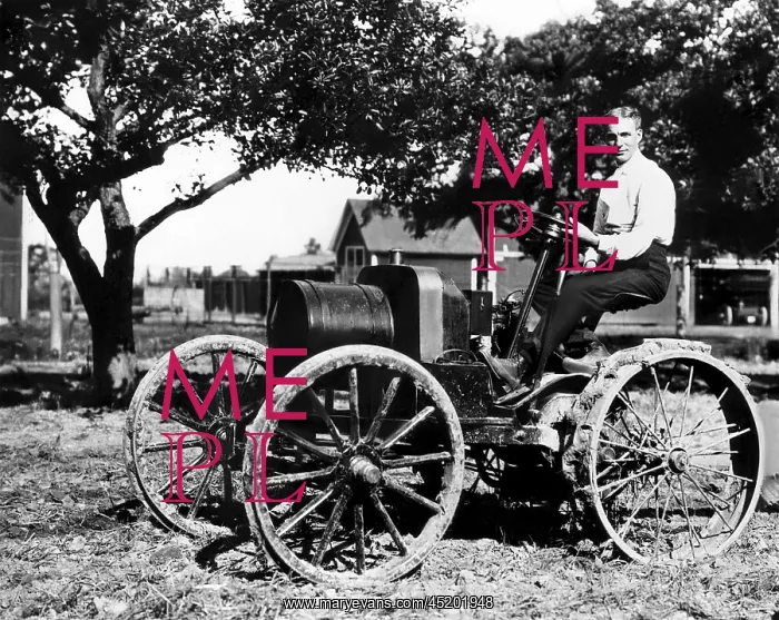 : Henry Ford at the controls of one of his ? : Henry Ford at the controls of one of his ?