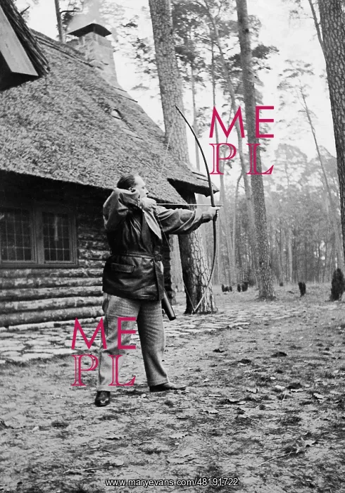 : Hermann Goring shoots with the bow, 1934 : Hermann Goring shoots with the bow, 1934
