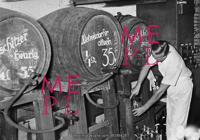 : Heurigen wine barrels in Vienna, 1937 : Heurigen wine barrels in Vienna, 1937