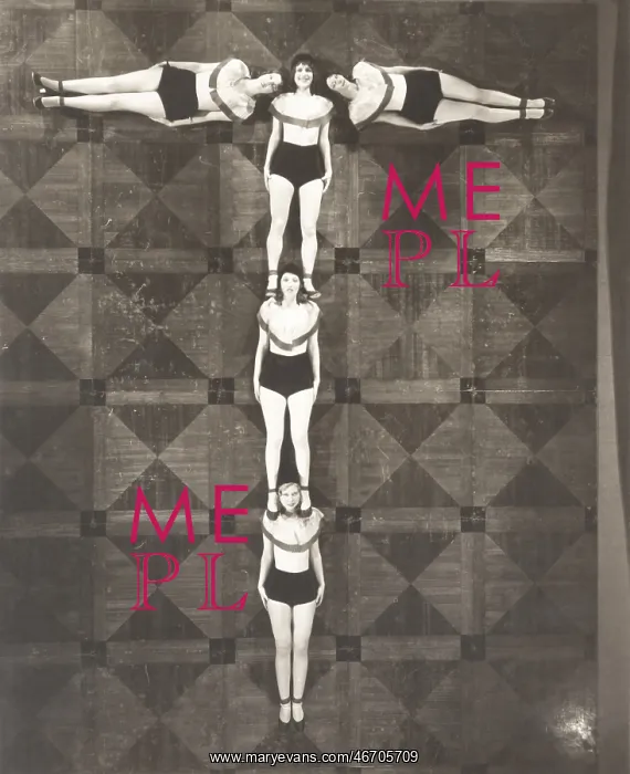 : High angle view of women forming the letter T : High angle view of women forming the letter T