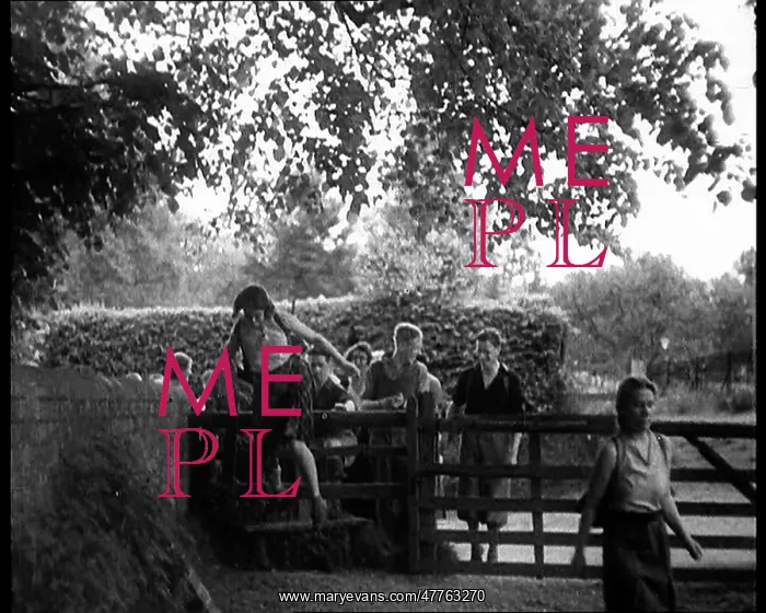 : Hikers Climbing over a Gate : Hikers Climbing over a Gate
