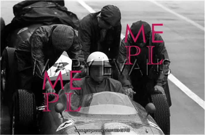 : Hill's Ferrari in pits, Silverstone, England : Hill's Ferrari in pits, Silverstone, England