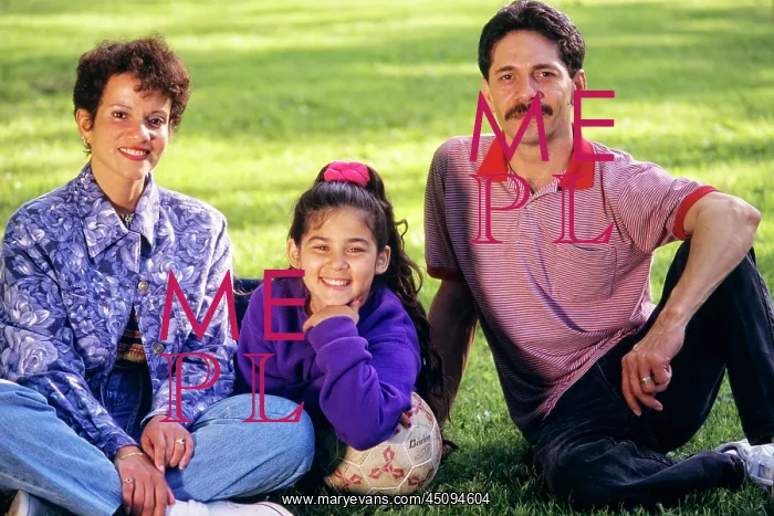 : Hispanic Father Mother and Daughter Sitting in : Hispanic Father Mother and Daughter Sitting in