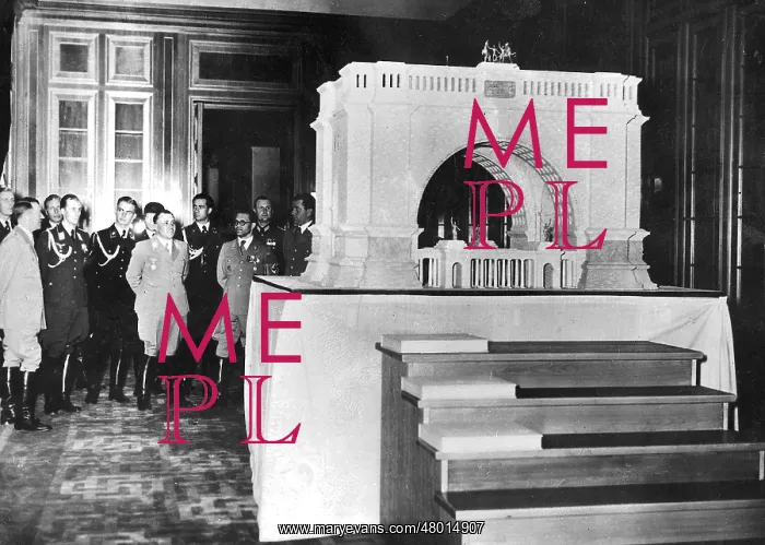 : Hitler, Speer, Bormann inspect a model of the triumphal arch : Hitler, Speer, Bormann inspect a model of the triumphal arch