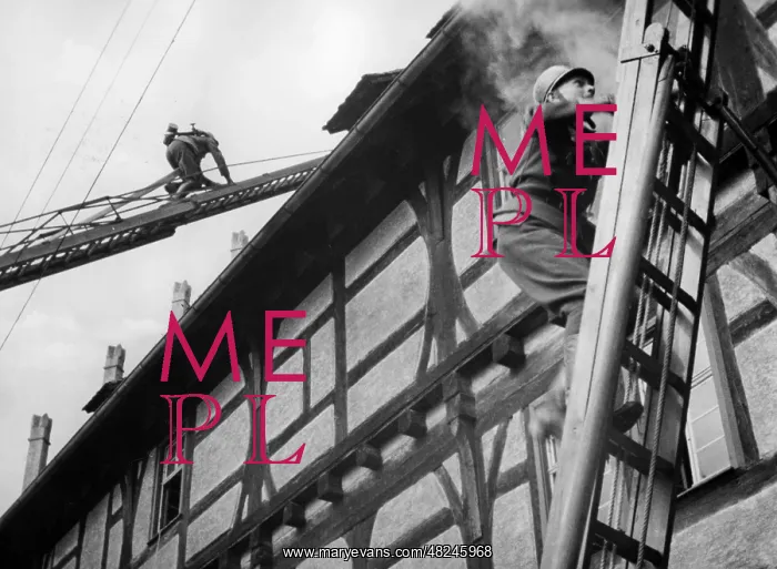 : HJ members as firefighters helpers, 1942 : HJ members as firefighters helpers, 1942