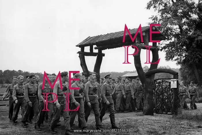 : HJ members march in a military training camp, 1942 : HJ members march in a military training camp, 1942