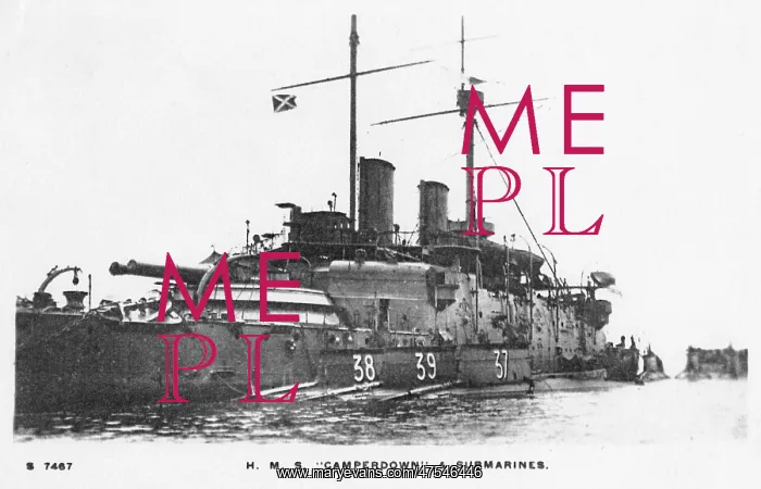 : HMS Camperdown with three submarines moored alongside : HMS Camperdown with three submarines moored alongside