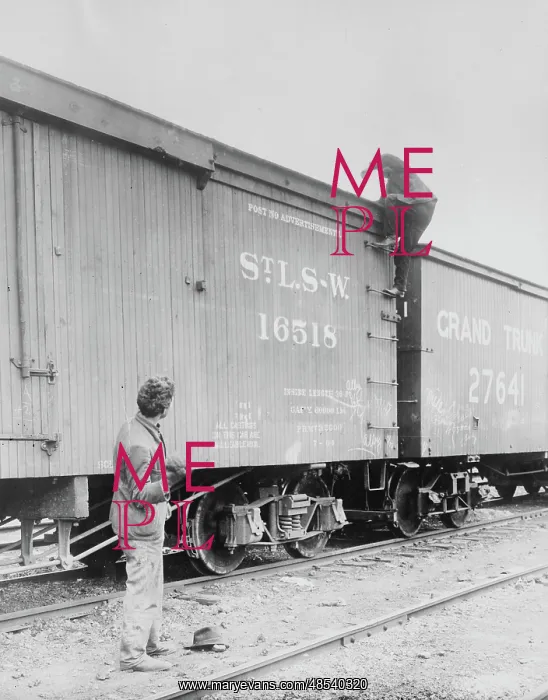 : Hobo Climbing Box Car, 20th Century : Hobo Climbing Box Car, 20th Century