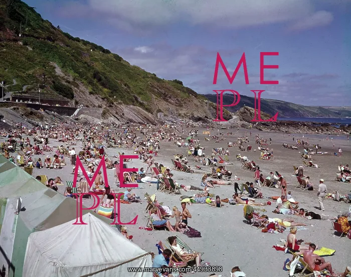 : Holidaymakers on the beach at Looe, Cornwall : Holidaymakers on the beach at Looe, Cornwall
