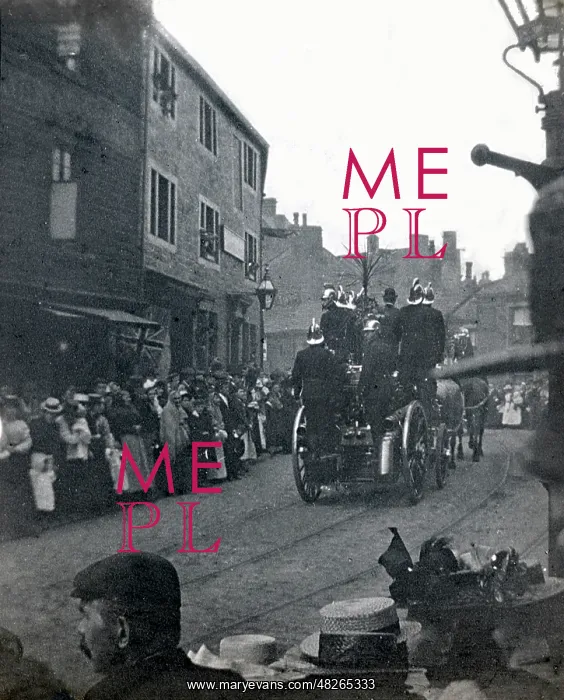: A Horse-drawn Fire Engine pulls quite a crowd : A Horse-drawn Fire Engine pulls quite a crowd