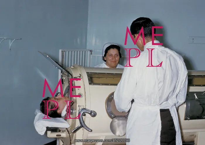 : Hospital staff are examining a patient in ? : Hospital staff are examining a patient in ?