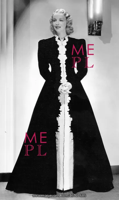 : A hostess gown of black velvet, designed by Dolly Tree : A hostess gown of black velvet, designed by Dolly Tree