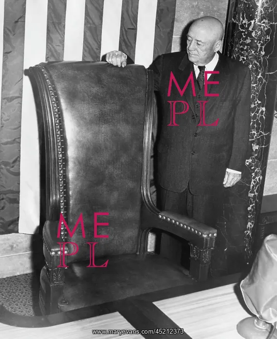 : House Speaker Sam Rayburn, looks over his ? : House Speaker Sam Rayburn, looks over his ?