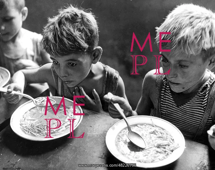 : Two hungry kids eating their soup : Two hungry kids eating their soup
