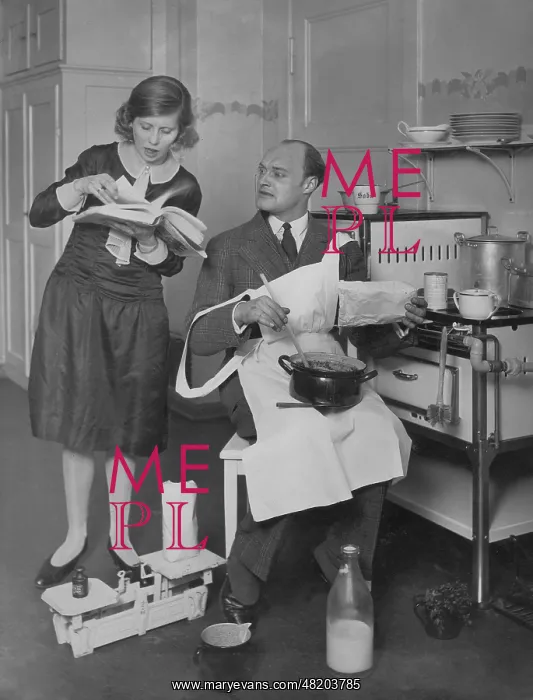 : Husband and wife cooking, 1927 : Husband and wife cooking, 1927
