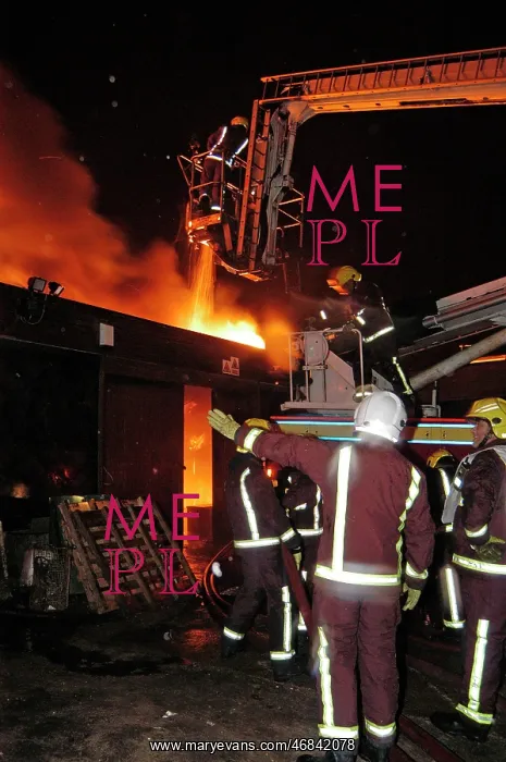 : Hydraulic platform at work on fire at commercial premises : Hydraulic platform at work on fire at commercial premises