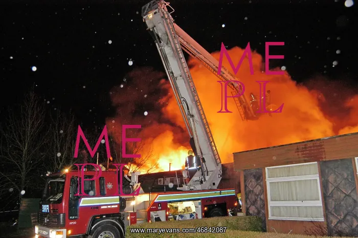 : Hydraulic platform at work on fire at commercial premises : Hydraulic platform at work on fire at commercial premises