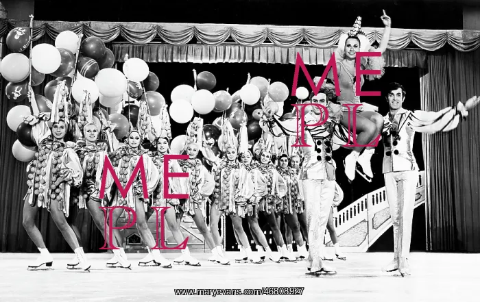 : Ice dancers in an ice revue : Ice dancers in an ice revue