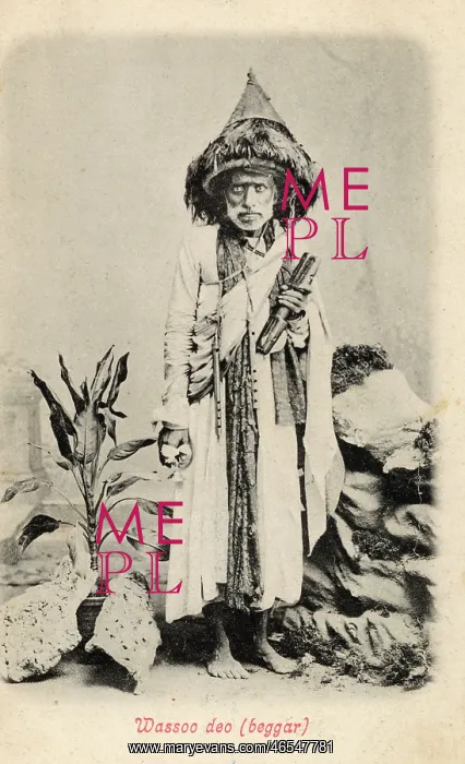 : Indian Beggar in remarkable hat : Indian Beggar in remarkable hat
