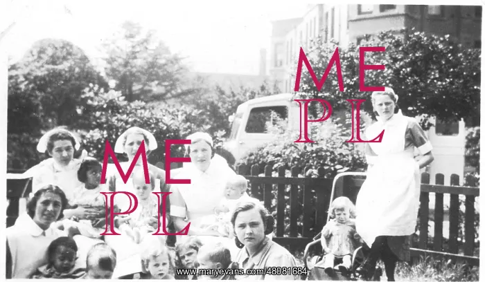 : Informal outdoor group of nurses and children : Informal outdoor group of nurses and children