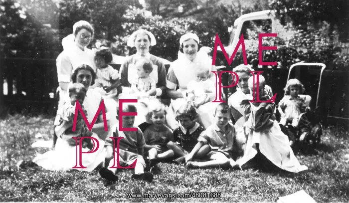 : Informal outdoor group of nurses and children : Informal outdoor group of nurses and children