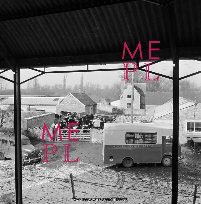 : Inglesham. A hygenic mobile stores van parked outside the cow houses at : Inglesham. A hygenic mobile stores van parked outside the cow houses at