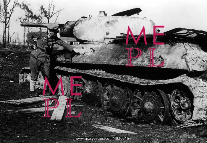 : Inspection of a destroyed T-45 tank, 1942 : Inspection of a destroyed T-45 tank, 1942