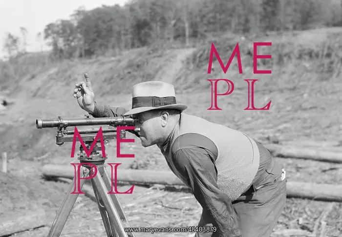 : Instrument man working on new construction : Instrument man working on new construction