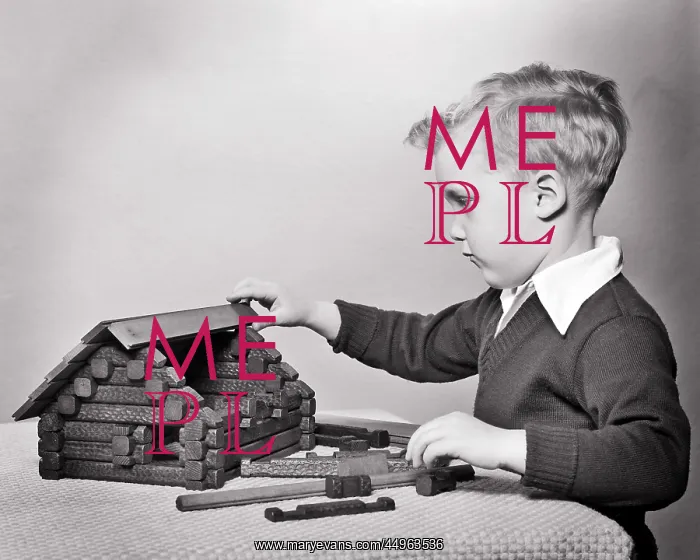 : Intent Young Blond Boy Playing Building Model : Intent Young Blond Boy Playing Building Model
