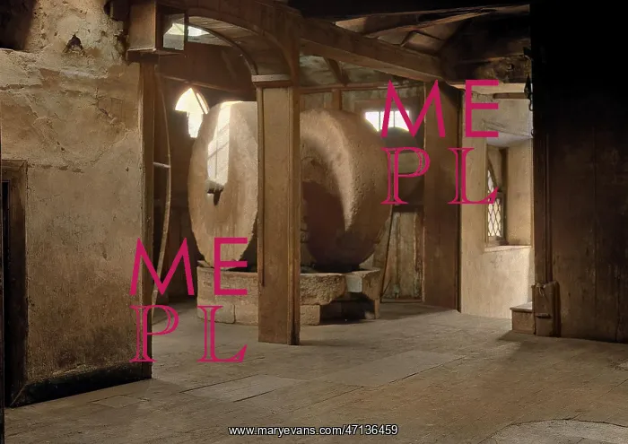 : Interior of a mill with two millstones : Interior of a mill with two millstones