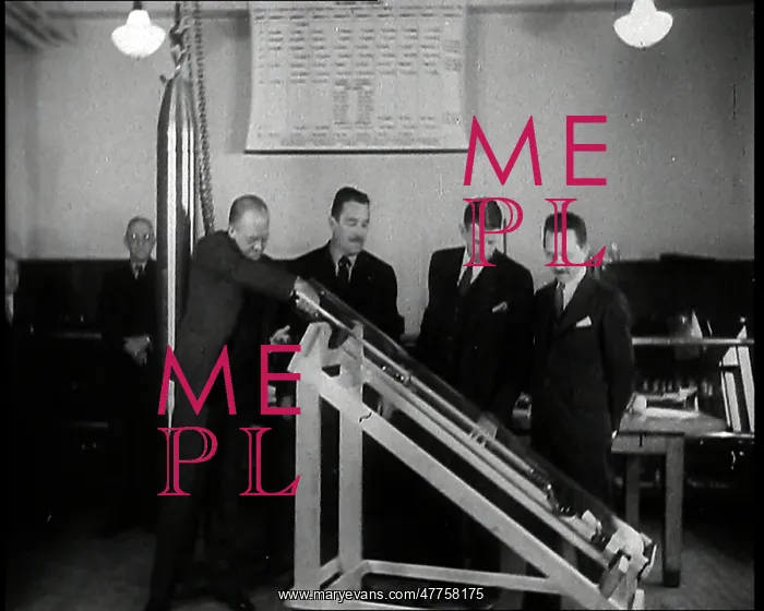 : Interior Shot of a British Man Inserting Various : Interior Shot of a British Man Inserting Various