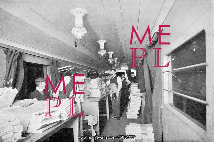 : Interior of a sorting car on a newspaper express train : Interior of a sorting car on a newspaper express train