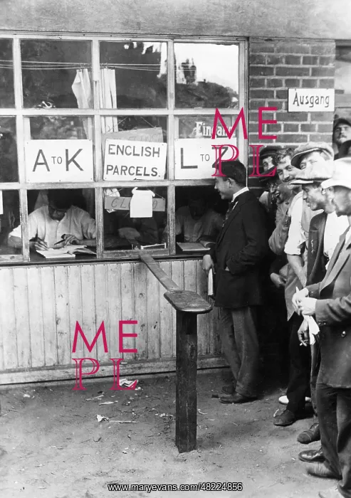 : Interned Brits queue for mail, 1915 : Interned Brits queue for mail, 1915