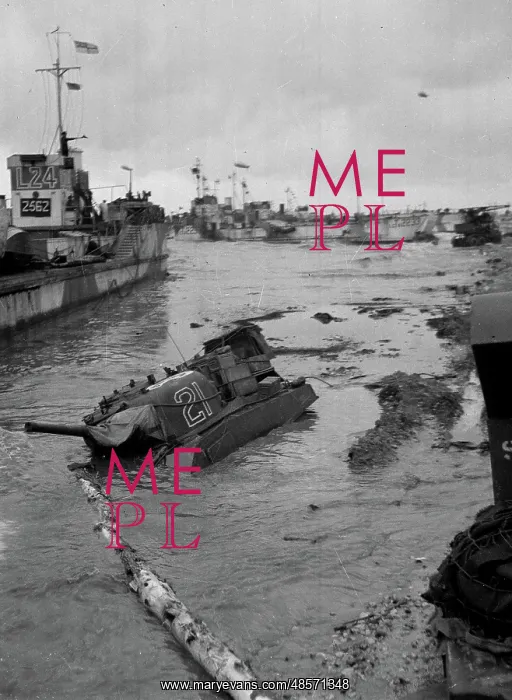 : Some invasion craft and a tank submerged : Some invasion craft and a tank submerged